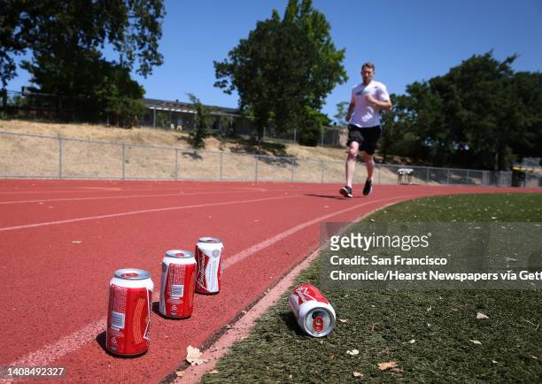 James Nielsen trains for a beer mile run in Novato, Calif. On Saturday, May 9, 2015. Nielsen broke the sub-5 minute barrier in the acclaimed beer...