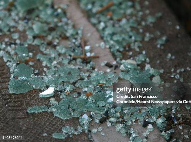 Shattered glass from a recent car break-in remains on the sidewalk on Bay Street near Kearny Street in San Francisco, Calif. On Wednesday, Sept. 9,...