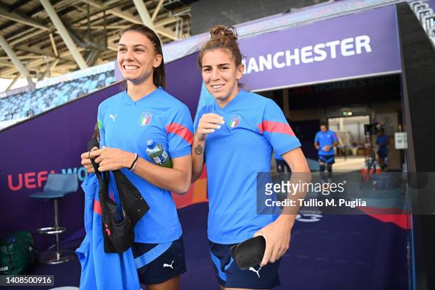 Agnese Bonfantini and Valentina Bergamaschi walk in before the UEFA Women's Euro England 2022 Italy Press Conference And Training Session at...