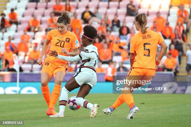 Diana Silva of Portugal is fouled by Dominique Janssen of The Netherlands leading to a penalty being awarded following a VAR check during the UEFA...