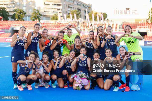 Players of Argentina pose for photo after winning the FIH Hockey Women's World Cup 2022, quarter finals, hockey match played between Argentina and...