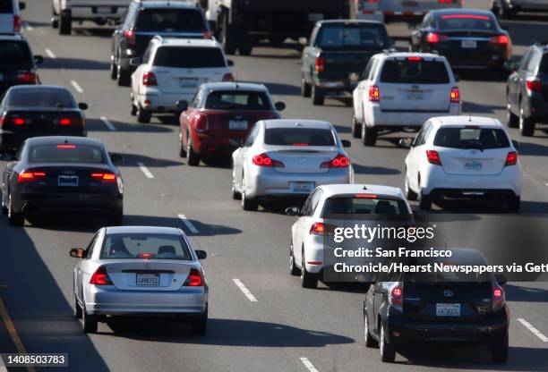 Brake lights are illuminated on cars travelling southbound on Highway 101 near the Poplar Avenue exit in San Mateo, Calif. On Wednesday, July 13,...