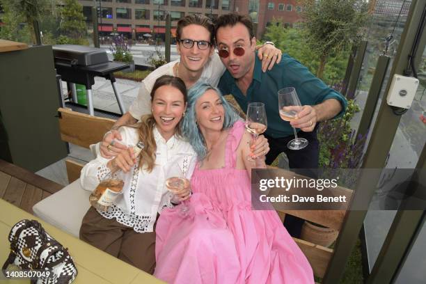 Emma Louise Connolly, Oliver Proudlock, Portia Freeman and Pete Denton attend the Quatre Vin x Aerial Rooftop launch party at The Broadcaster on July...