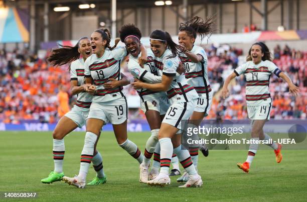 Diana Silva of Portugal celebrates with teammates after scoring their team's second goal during the UEFA Women's Euro 2022 group C match between...
