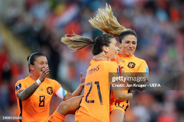 Danielle van de Donk celebrates after scoring their team's third goal with Damaris Egurrola of The Netherlands during the UEFA Women's Euro 2022...
