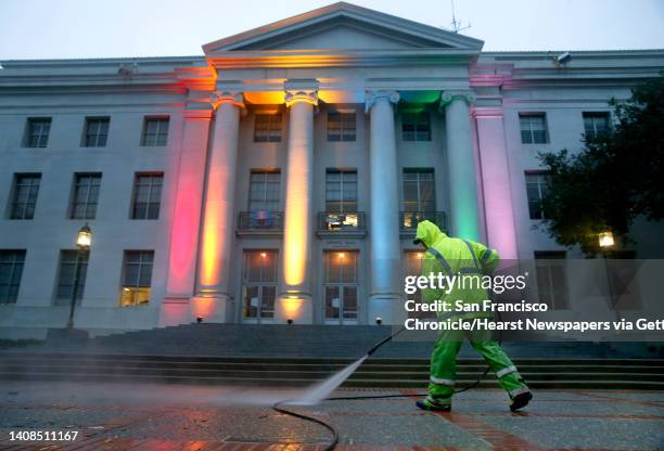Kim Au power washes the steps of Sproul Hall on the UC Berkeley campus on Thursday, Feb. 2, 2017 after Wednesday night's planned protest against an...
