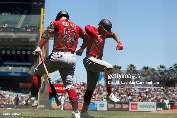 Ketel Marte of the Arizona Diamondbacks celebrates after hitting a solo home run in the top of the third inning against the San Francisco Giants at...