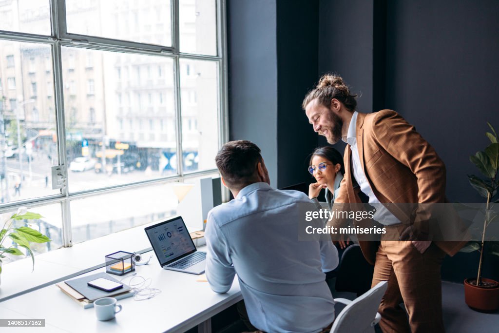 Businesspeople Working Together On A New Project At Their Company