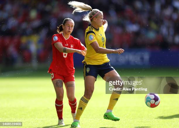Hanna Glas of Sweden is closed down by Geraldine Reuteler of Switzerland during the UEFA Women's Euro England 2022 group C match between Sweden and...