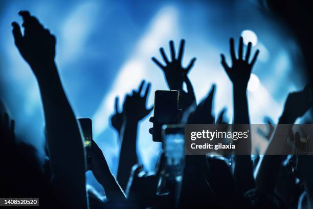 rave party silhouettes. - music fans stock pictures, royalty-free photos & images