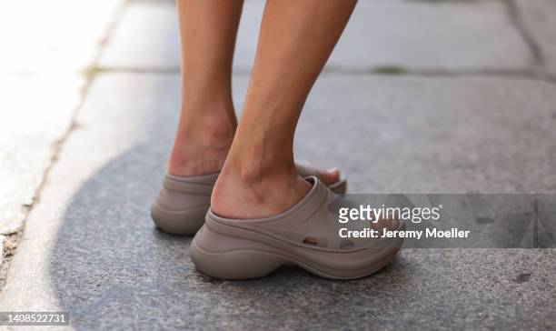 Anna Winter is seen wearing Balenciaga Rubber Pool slide sandals in beige on July 12, 2022 in Berlin, Germany.