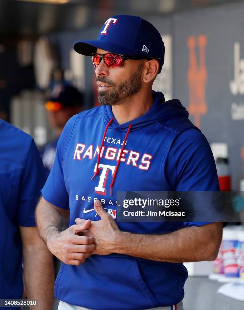 Manager Chris Woodward of the Texas Rangers looks on before a game against the New York Mets at Citi Field on July 03, 2022 in New York City. The...