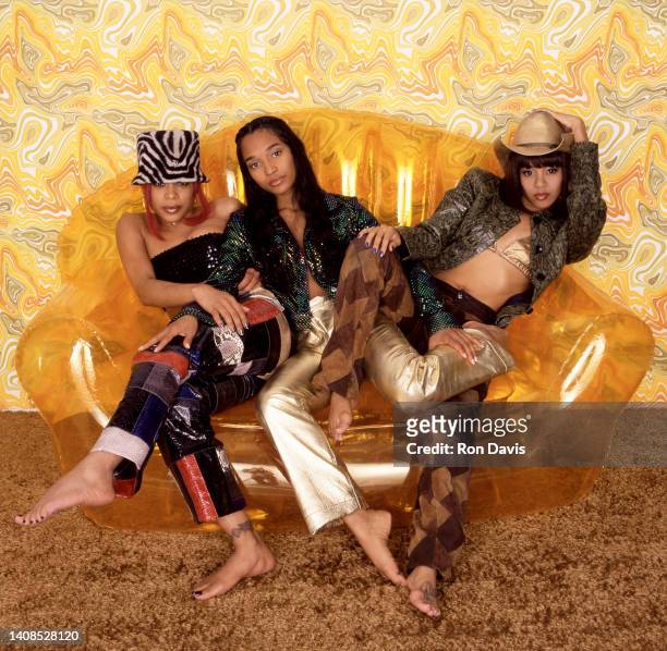 American singers, Tionne T-Boz Watkins, Rozonda Chilli Thomas and Lisa Left Eye Lopes , of the American girl group TLC, pose for a studio portrait in...