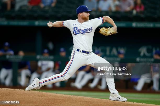 Jon Gray of the Texas Rangers throws a pitch against the Oakland Athletics in the first inning at Globe Life Field on July 13, 2022 in Arlington,...