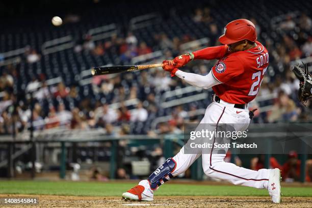 Juan Soto of the Washington Nationals hits a home run against the Seattle Mariners during the ninth inning of game two of a doubleheader at Nationals...