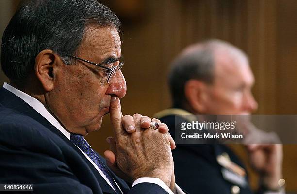 Defense Secretary Leon Panetta and Chairman of the Joint Chiefs of Staff Gen. Martin Dempsey participate in a Senate Armed Services Committee hearing...
