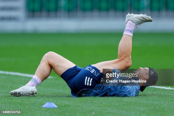 Roger Tuivasa-Sheck stretches during a New Zealand All Blacks training session at Sky Stadium on July 14, 2022 in Wellington, New Zealand.