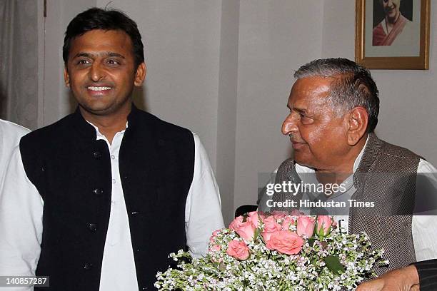 Samajwadi Party leader Mulayam Singh Yadav and his son Akhilesh Yadav meet with Governor of Uttar Pradesh Banwari Lal Joshi at the governor's house...