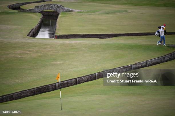 Min Woo Lee of Australia walks on the 1st hole during Day One of The 150th Open at St Andrews Old Course on July 14, 2022 in St Andrews, Scotland.