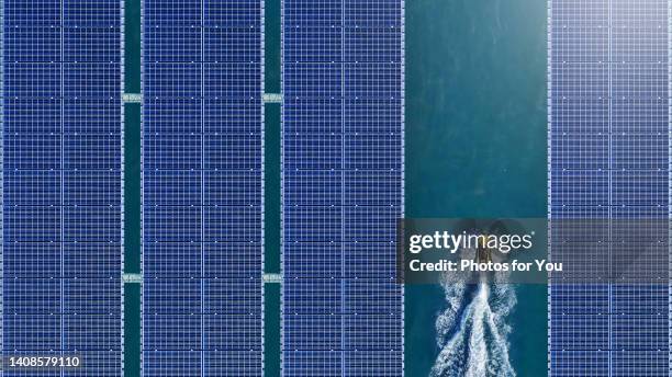 aerial view/solar panel floating in the dam a clean energy source - förnyelsebar energi bildbanksfoton och bilder