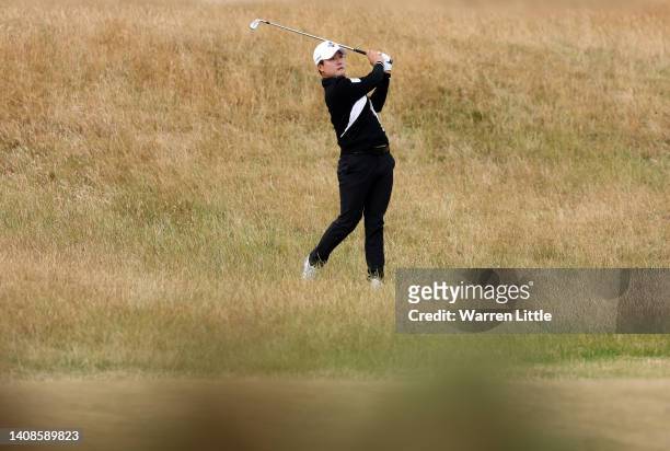 Minkyu Kim of South Korea plays their second shot on the fourth hole during Day One of The 150th Open at St Andrews Old Course on July 14, 2022 in St...
