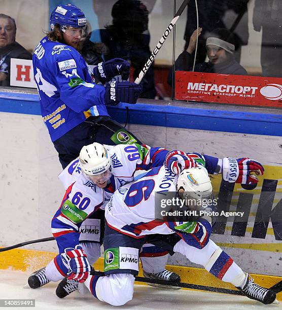 Jonas Junland of the Barys, Tomas Rolinek and Daniil Markov of the Metallurg during the play-off game between Metallurg Magnitogorsk and Barys Astana...