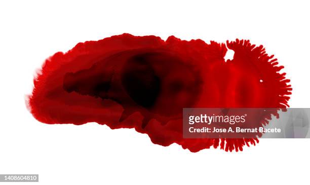 full frame of drops and splashes of red paint on a white canvas. - blood stained stock pictures, royalty-free photos & images