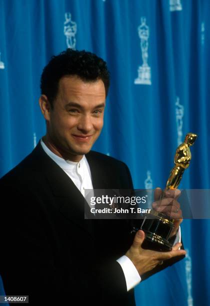 Actor Tom Hanks receives his Oscar at the Academy Awards in Los Angeles, CA., March 29, 1995.