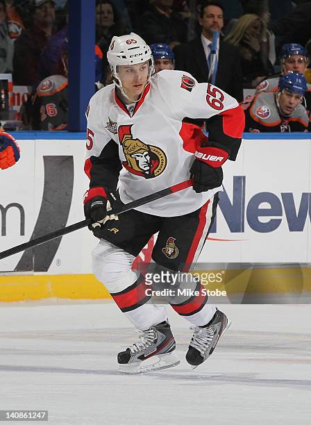Erik Karlsson of the Ottawa Senators skates against the New York Islanders at Nassau Veterans Memorial Coliseum on February 20, 2012 in Uniondale,...