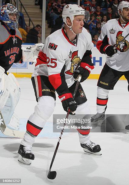 Chris Neil of the Ottawa Senators skates against the New York Islanders at Nassau Veterans Memorial Coliseum on February 20, 2012 in Uniondale, New...