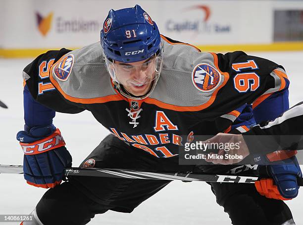 John Tavares of the New York Islanders skates against the Ottawa Senators at Nassau Veterans Memorial Coliseum on February 20, 2012 in Uniondale, New...