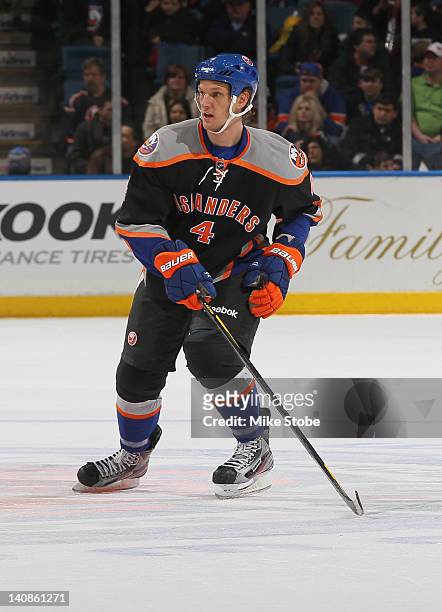 Mark Eaton of the New York Islanders skates against the Ottawa Senators at Nassau Veterans Memorial Coliseum on February 20, 2012 in Uniondale, New...