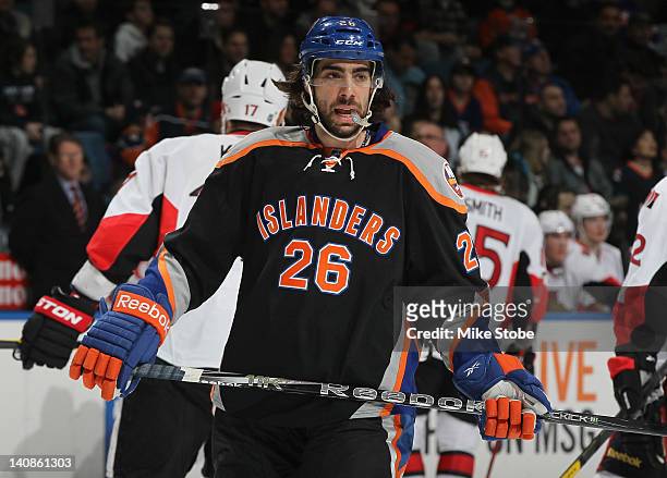 Matt Moulson of the New York Islanders skates against the Ottawa Senators at Nassau Veterans Memorial Coliseum on February 20, 2012 in Uniondale, New...