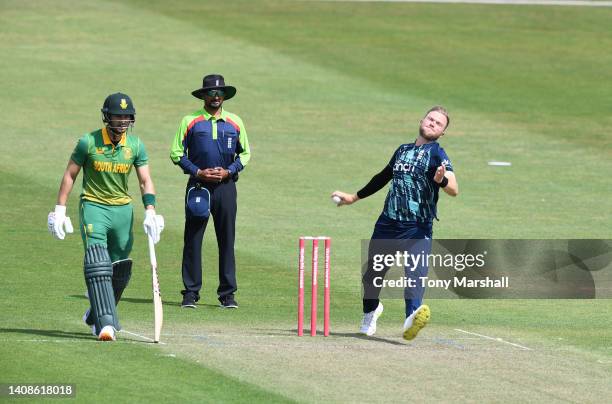 Sam Cook of England Lions bowls during the tour match between England Lions and South Africa at New Road on July 14, 2022 in Worcester, England.