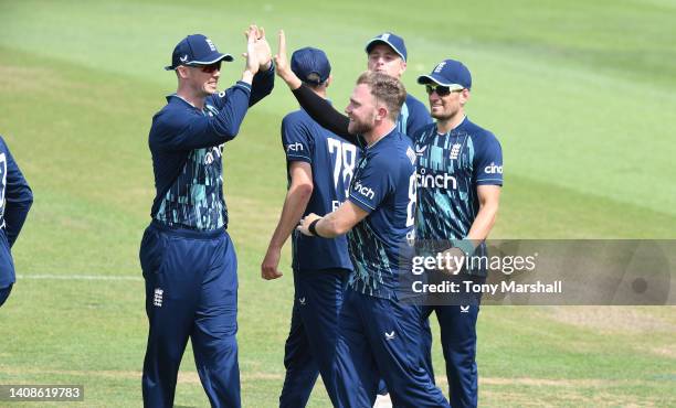 Sam Cook of England Lions celebrates taking the wicket of Janneman Malan of South Africa during the tour match between England Lions and South Africa...