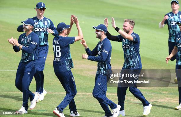 Sam Cook of England Lions celebrates taking the wicket of Janneman Malan of South Africa during the tour match between England Lions and South Africa...