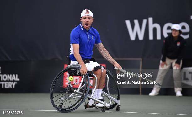 Andy Lapthorne of Great Britain reacts as he plays against Donald Ramphadi during day three of the British Open Wheelchair Tennis Championships at...