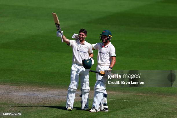 Colin Ackermann of Leicestershire celebrates with team mate Wiaan Mulder after scoring a double century during the LV= Insurance County Championship...