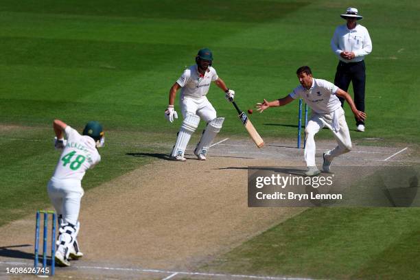 Steve Finn of Sussex attempts a catch after bowling to Colin Ackermann of Leicestershire during the LV= Insurance County Championship match between...