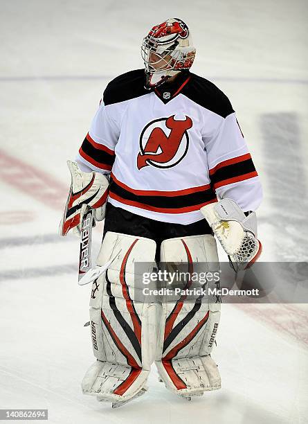 Johan Hedberg of the New Jersey Devils warms up before a game against the Washington Capitals at Verizon Center on March 2, 2012 in Washington, DC.