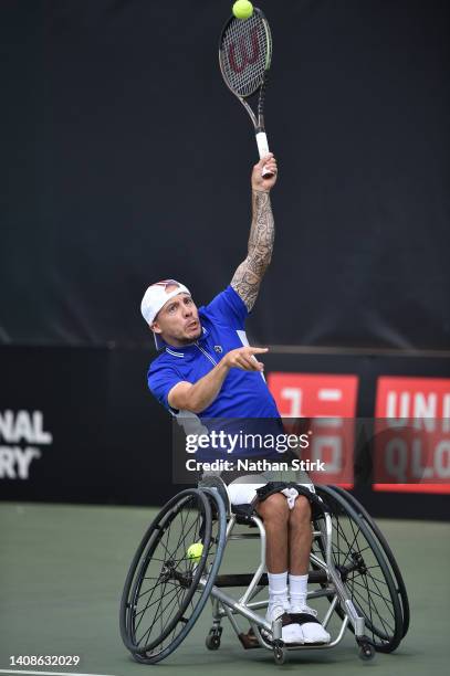 Andy Lapthorne of Great Britain serves to Donald Ramphadi during day three of the British Open Wheelchair Tennis Championships at Nottingham Tennis...