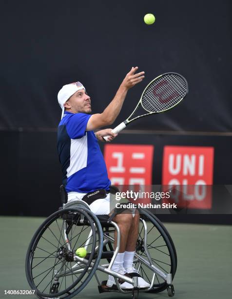 Andy Lapthorne of Great Britain serves to Donald Ramphadi during day three of the British Open Wheelchair Tennis Championships at Nottingham Tennis...