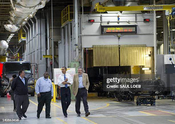 President Barack Obama tours the Daimler Trucks North America Manufacturing plant prior to speaking on the economy and jobs in Mount Holly, North...