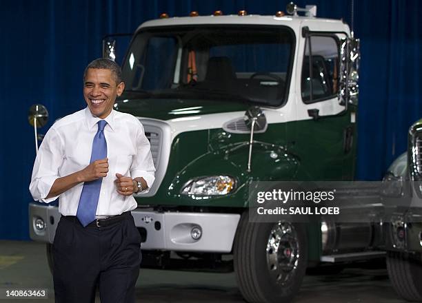 President Barack Obama tours the Daimler Trucks North America Manufacturing plant prior to speaking on the economy and jobs in Mount Holly, North...