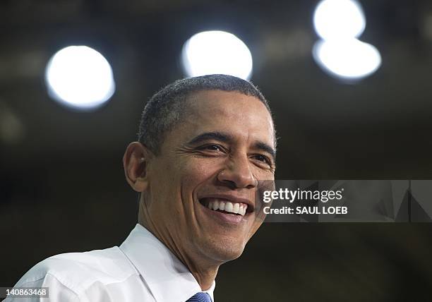 President Barack Obama speaks on the economy and fuel consumption after touring the Daimler Trucks North America Manufacturing plant in Mount Holly,...