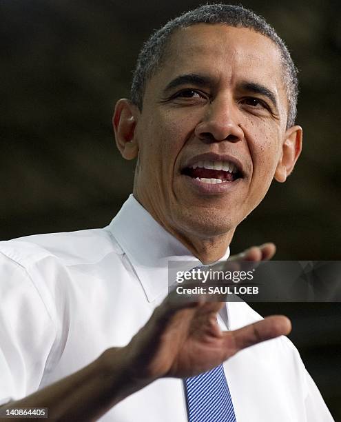 President Barack Obama speaks on the economy and fuel consumption following a tour of the Daimler Trucks North America Manufacturing plant in Mount...