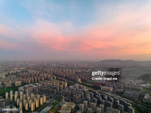 aerial photography of the urban scenery of hangzhou, china with the sky full of red clouds at sunrise - hangzhou bildbanksfoton och bilder