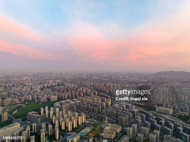 aerial photography of the urban scenery of hangzhou, china with the sky full of red clouds at sunrise - hangzhou bildbanksfoton och bilder