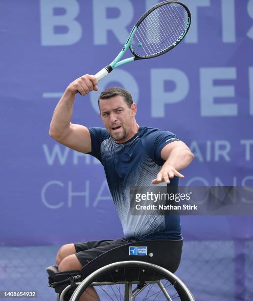 Joachim Gerard of Belgium plays against Frederic Cattaneo of France during day three of the British Open Wheelchair Tennis Championships at...