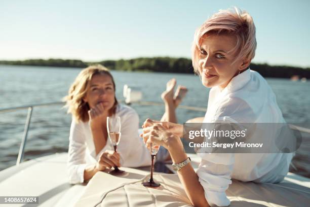 friends having fun on boat trip - yachting stock pictures, royalty-free photos & images